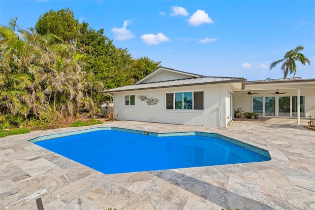 view of pool featuring a patio area and ceiling fan