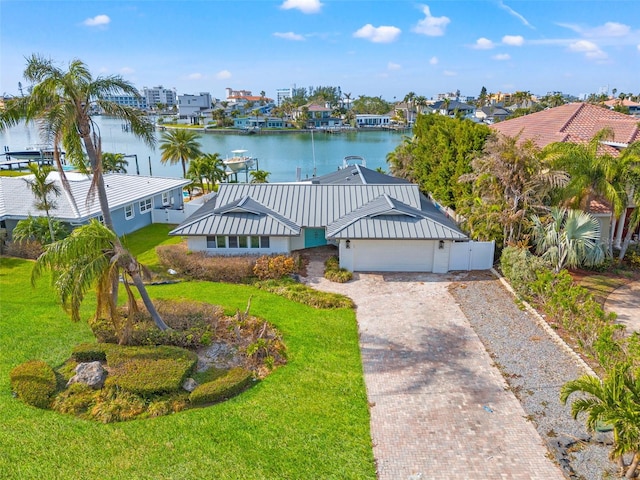 birds eye view of property featuring a water view