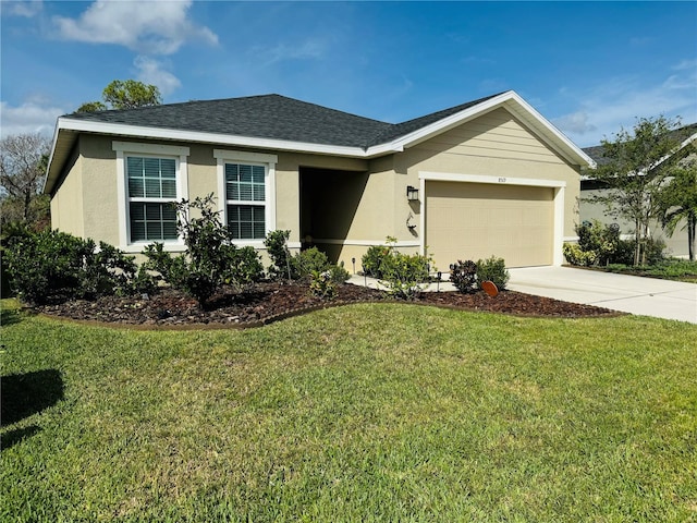 ranch-style home with a front lawn and a garage