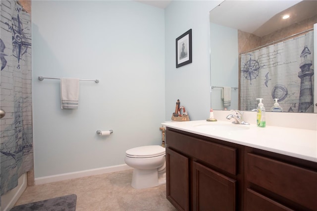 bathroom featuring tile patterned flooring, a shower with curtain, vanity, and toilet