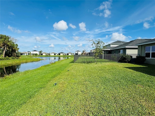 view of yard with a water view