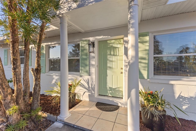 property entrance featuring covered porch