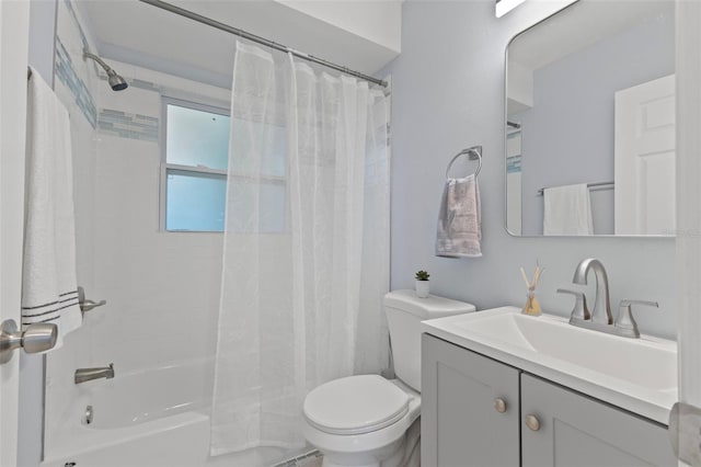 full bathroom featuring vanity, toilet, and shower / bath combo with shower curtain