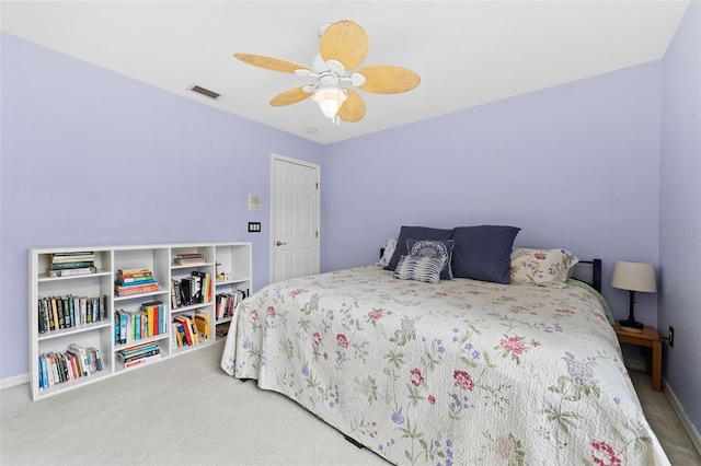 bedroom featuring ceiling fan and carpet flooring