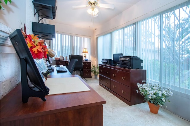 office space with ceiling fan