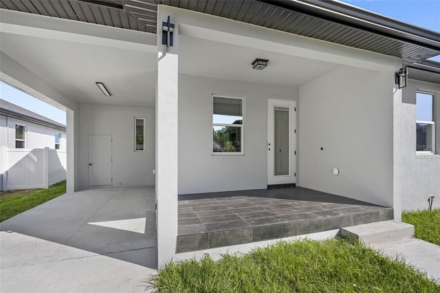 doorway to property featuring a patio