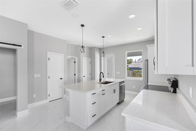 kitchen with sink, black range oven, white cabinets, stainless steel dishwasher, and a kitchen island with sink