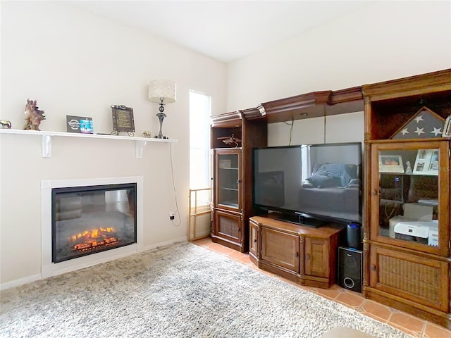 unfurnished living room with a wealth of natural light and light carpet