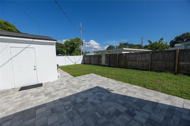 view of patio with a shed