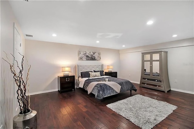 bedroom featuring dark wood-type flooring