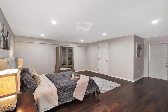 bedroom featuring dark wood-type flooring