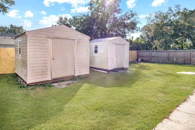 view of outdoor structure with a lawn