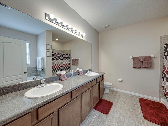 full bathroom featuring independent shower and bath, vanity, and tile patterned flooring