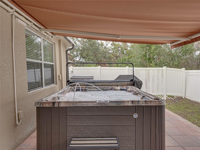 view of patio featuring a hot tub