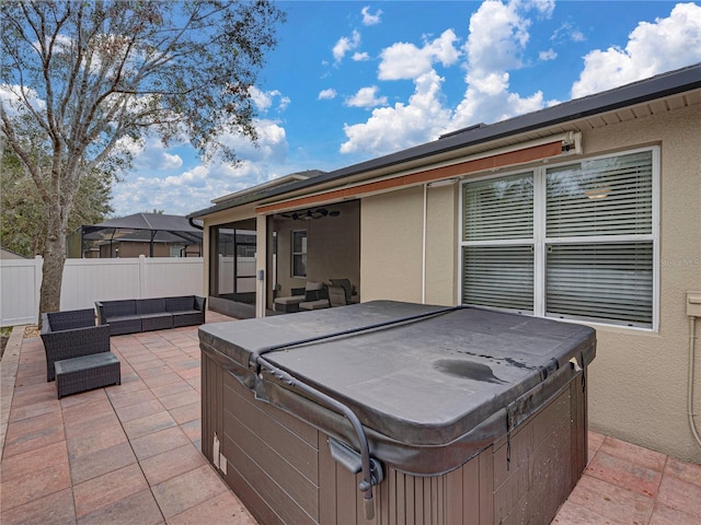 view of patio with a hot tub