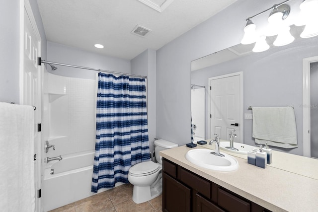 full bathroom with vanity, tile patterned flooring, toilet, and shower / tub combo