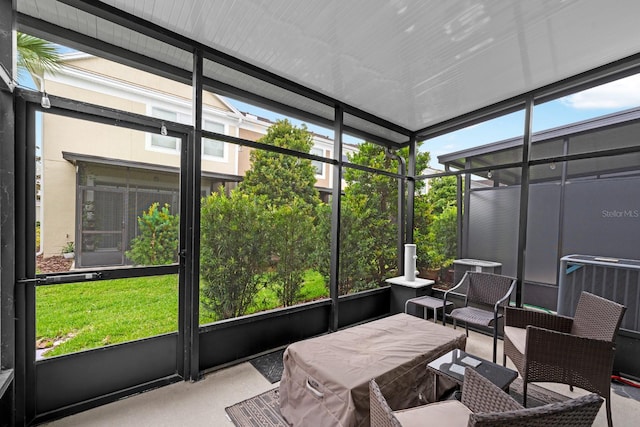 sunroom featuring a healthy amount of sunlight