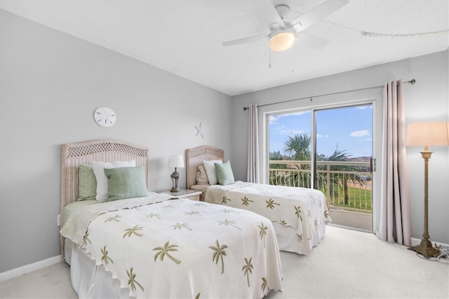 bedroom featuring light colored carpet, ceiling fan, and access to outside