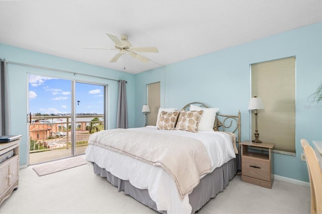 bedroom with a ceiling fan, access to outside, light colored carpet, and baseboards