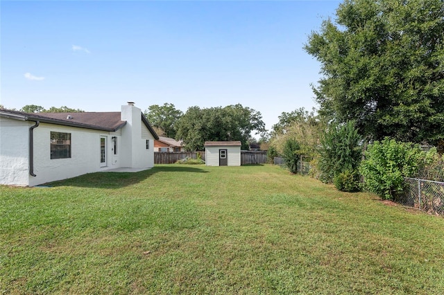 view of yard with a shed