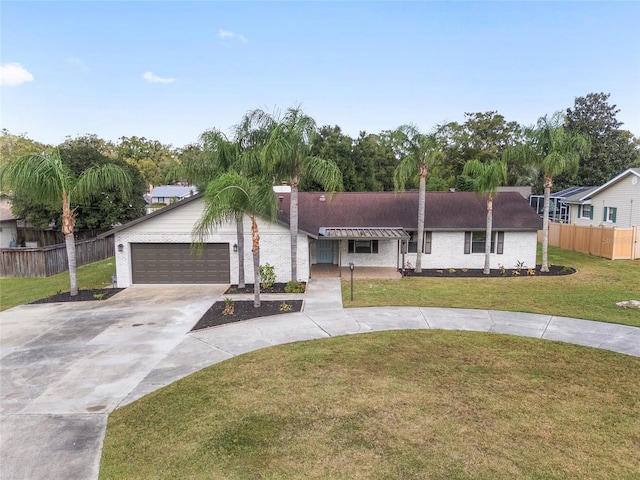 ranch-style house with a front yard and a garage