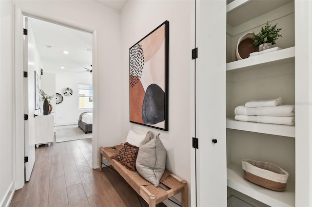 hallway featuring hardwood / wood-style floors