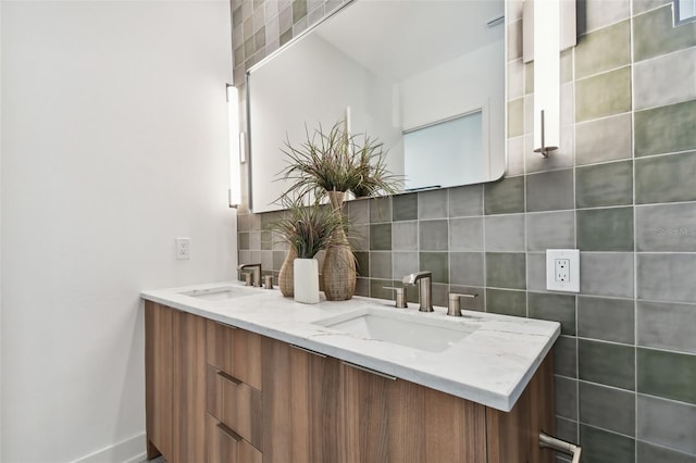 bathroom featuring backsplash and vanity