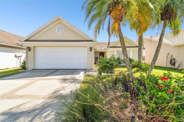 single story home with a garage