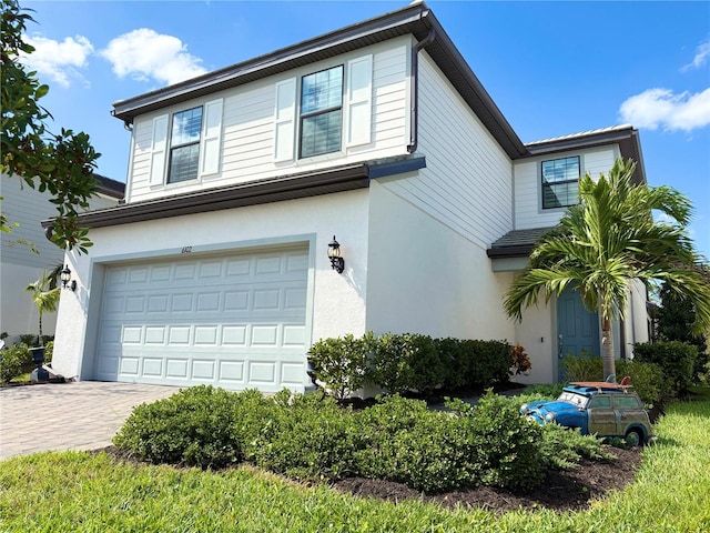 view of front of home with a garage