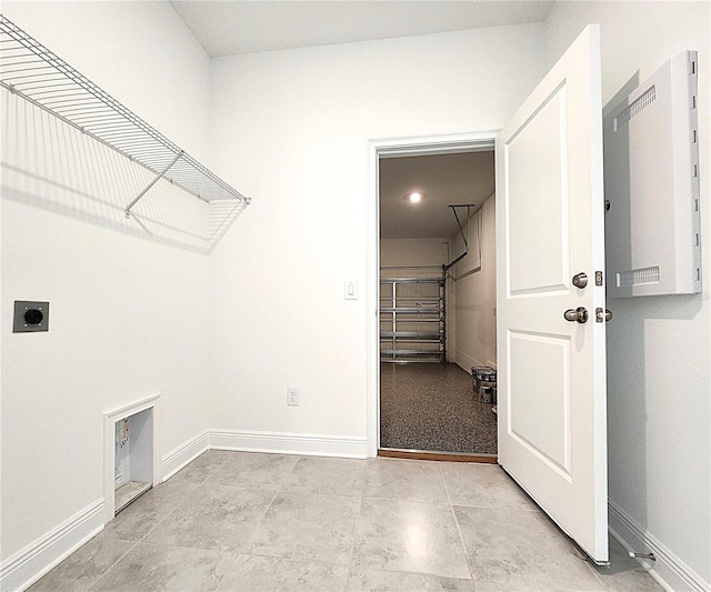 clothes washing area featuring electric dryer hookup