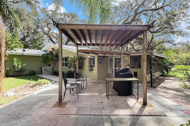 view of patio / terrace with a pergola