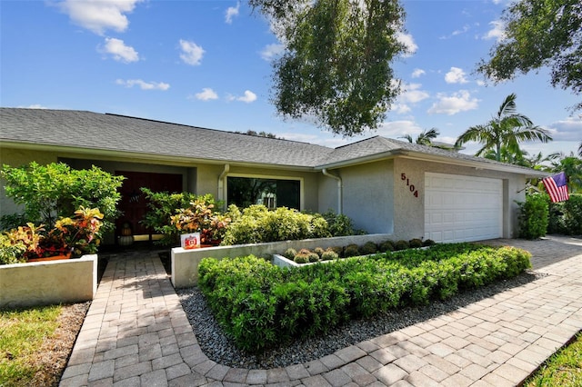 ranch-style house with a garage