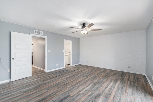 unfurnished bedroom featuring ceiling fan, dark hardwood / wood-style floors, and ensuite bathroom