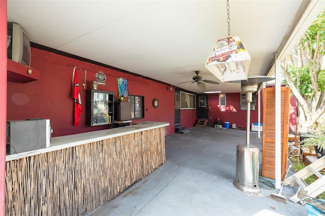 view of patio / terrace featuring ceiling fan