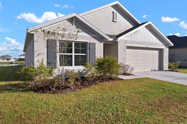 view of front of house with a front lawn and a garage