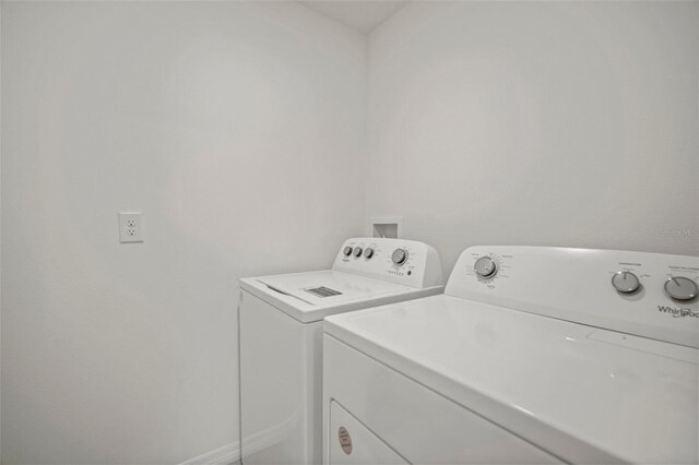 laundry area featuring separate washer and dryer