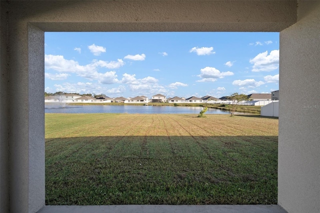 view of yard with a water view