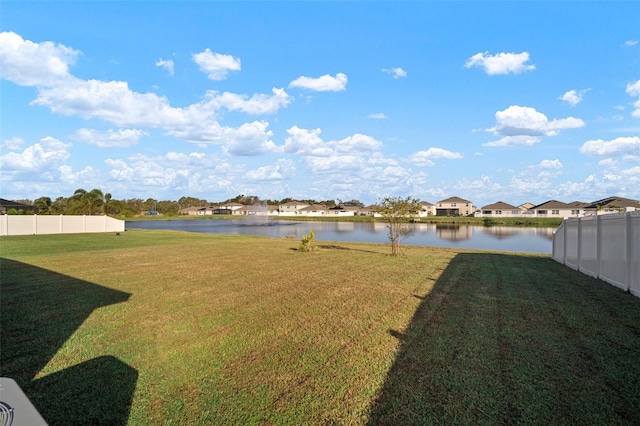 view of yard with a water view