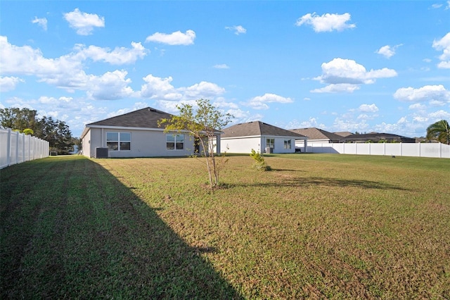 view of yard featuring central AC unit