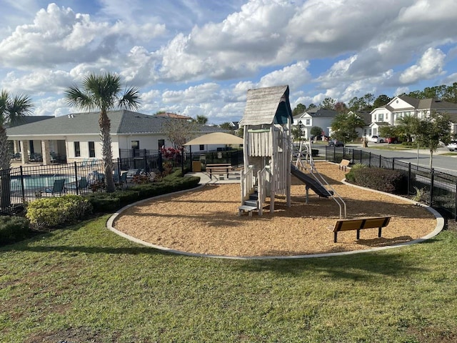 view of playground featuring a yard