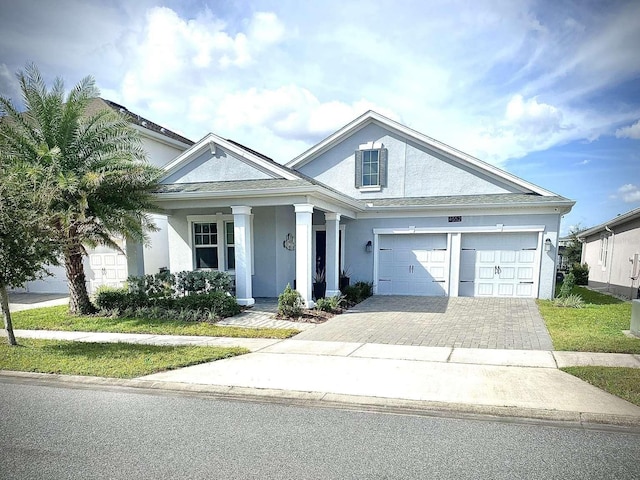 view of front of property featuring a garage