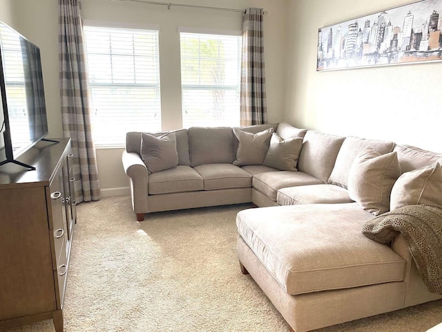 living room featuring light carpet