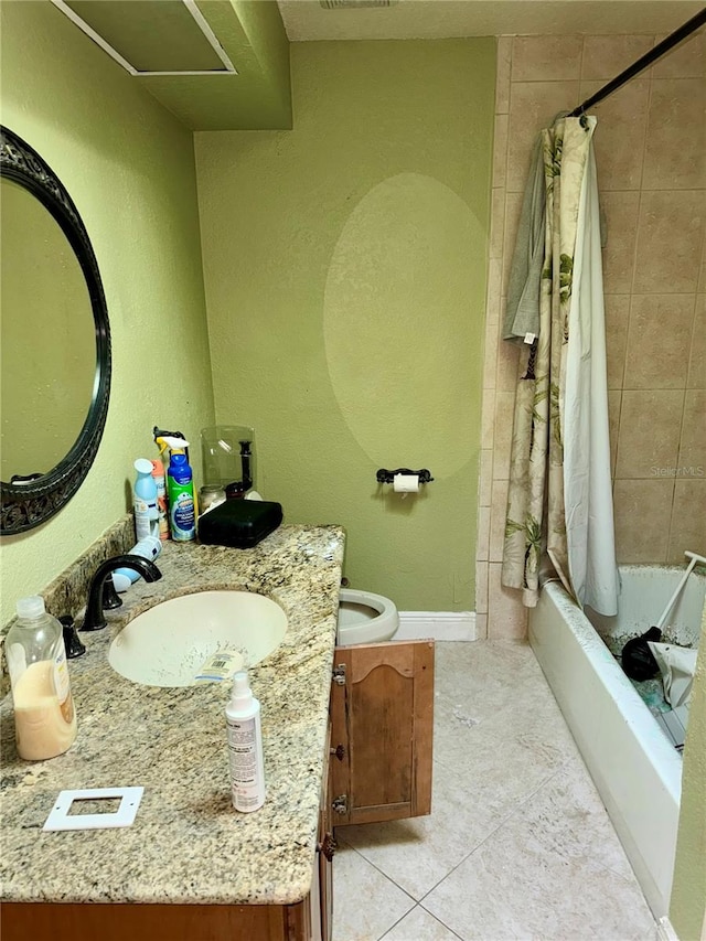 bathroom featuring tile patterned flooring, vanity, and shower / bath combination with curtain