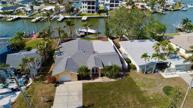 aerial view featuring a residential view and a water view