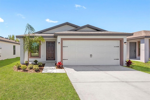 ranch-style home with a garage and a front yard