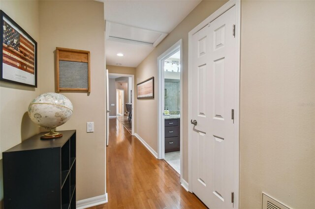 hall featuring light hardwood / wood-style floors