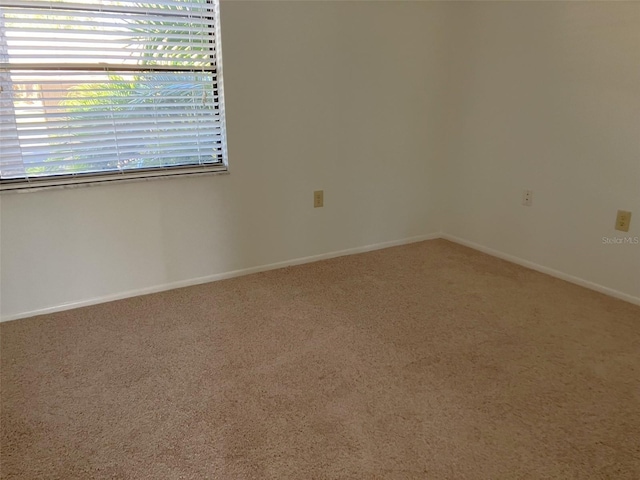 view of carpeted spare room