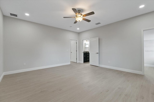 unfurnished bedroom featuring light hardwood / wood-style floors and ceiling fan