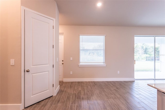 spare room with light hardwood / wood-style floors