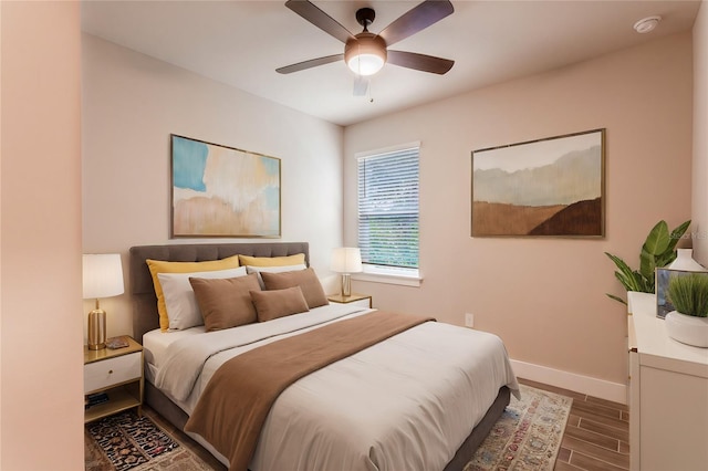 bedroom featuring wood-type flooring and ceiling fan